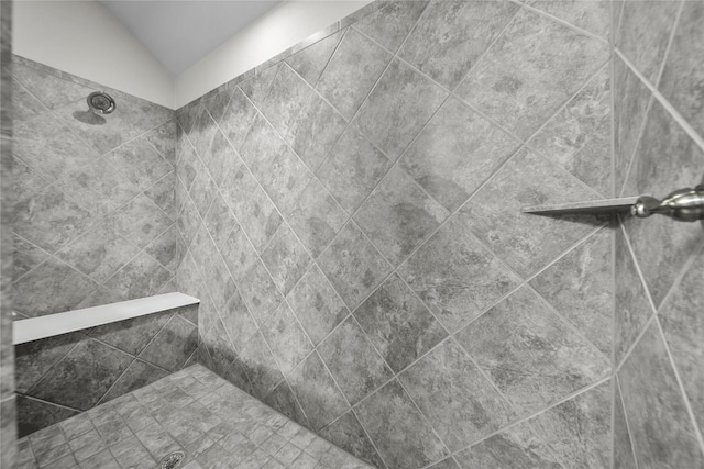 details featuring a tile shower