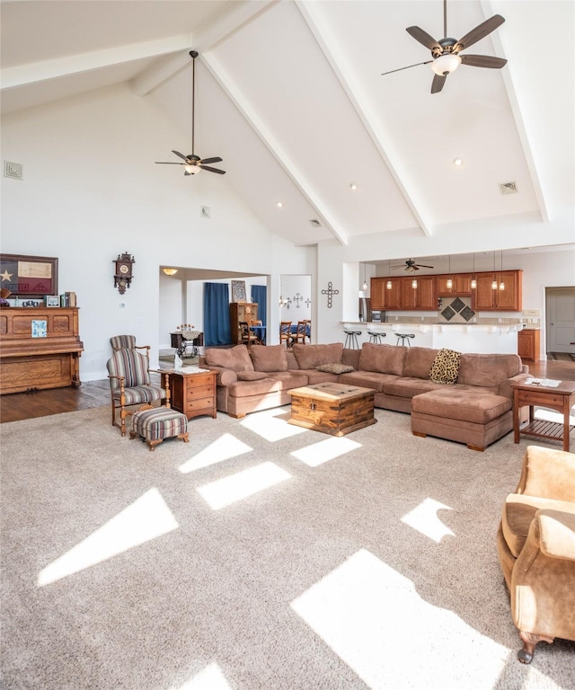 13 Brookhaven Dr, Lucas, TX 75002 - carpeted living room with beam ceiling, a ceiling fan, visible vents, and high vaulted ceiling
