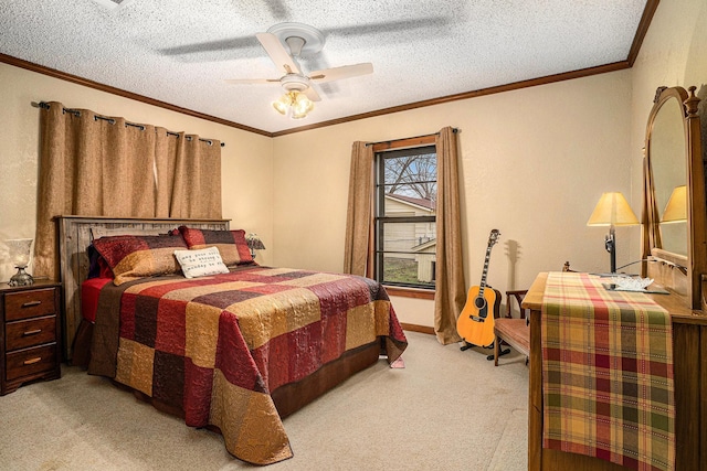 bedroom with ceiling fan, ornamental molding, light carpet, and a textured ceiling
