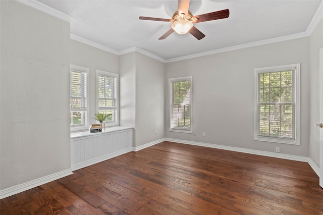 spare room featuring ceiling fan, a wealth of natural light, and dark wood-style flooring