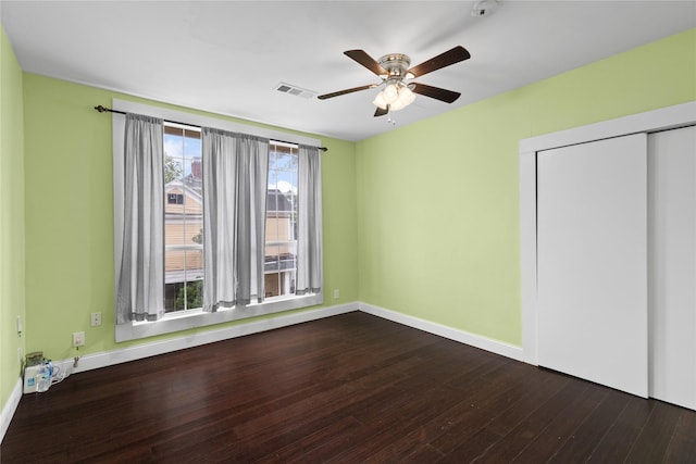 501 N Anglin St, Cleburne, TX 76031 - interior space with a closet, ceiling fan, dark wood finished floors, baseboards, and visible vents