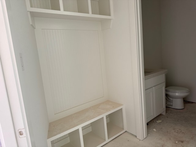 mudroom featuring unfinished concrete floors