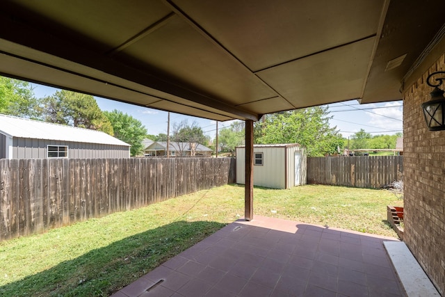 view of patio / terrace featuring a fenced backyard, an outdoor structure, and a storage shed