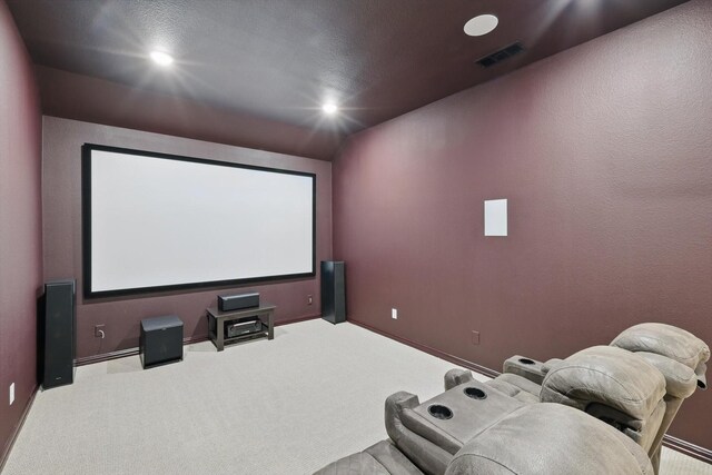 home theater room with baseboards, carpet flooring, visible vents, and recessed lighting
