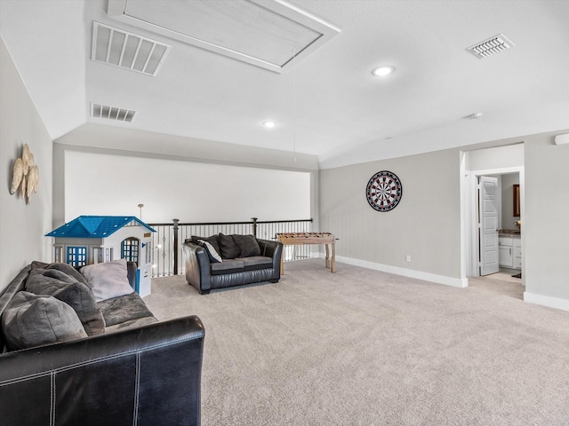 178 Dundee Ct, Argyle, TX 76226 - carpeted living area with attic access, baseboards, and visible vents