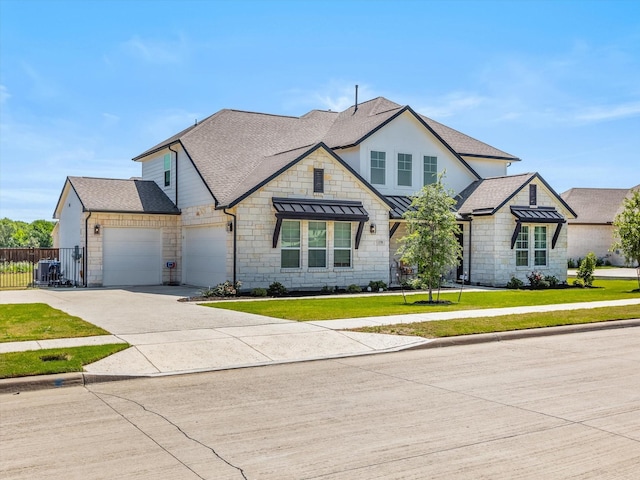178 Dundee Ct, Argyle, TX 76226 - view of front of home with stone siding, a standing seam roof, fence, and a front yard