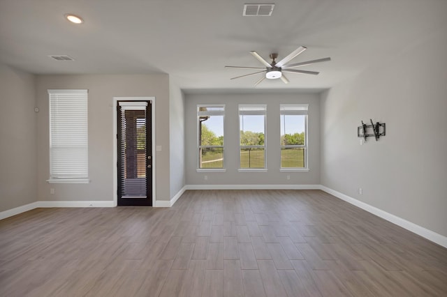 731 Calvin Way, Celina, TX 75009 - interior space with baseboards, visible vents, dark wood-style flooring, and a ceiling fan