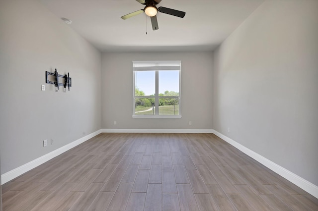 731 Calvin Way, Celina, TX 75009 - unfurnished bedroom with light wood-style floors, baseboards, ensuite bathroom, and a ceiling fan