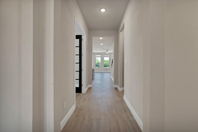 731 Calvin Way, Celina, TX 75009 - corridor with baseboards, light wood finished floors, and recessed lighting
