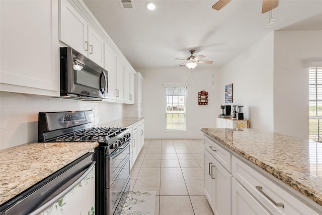 3450 County Road 2156, Caddo Mills, TX 75135 - kitchen featuring a ceiling fan, gas stove, backsplash, white cabinets, and recessed lighting