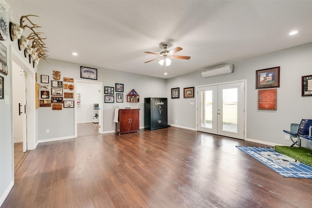 3450 County Road 2156, Caddo Mills, TX 75135 - living room featuring a wall mounted air conditioner, a ceiling fan, dark wood-style floors, french doors, and recessed lighting