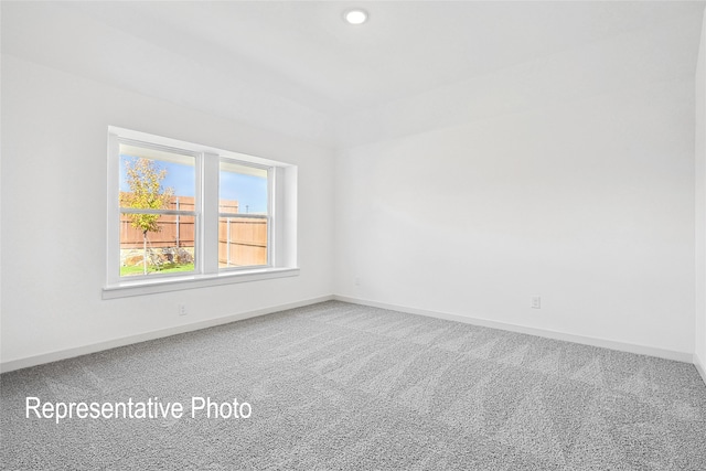 1385 Cider St, Forney, TX 75126 - carpeted spare room with baseboards and recessed lighting