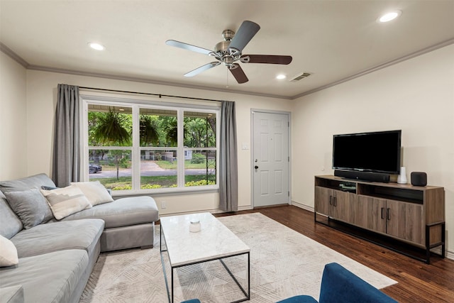4829 Red Oak Ln, River Oaks, TX 76114 - living room with visible vents, dark wood-style floors, ceiling fan, and crown molding