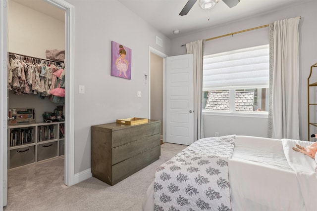 13645 Sweetwalk Pl, Fort Worth, TX 76008 - bedroom featuring a walk in closet, carpet floors, a closet, and a ceiling fan