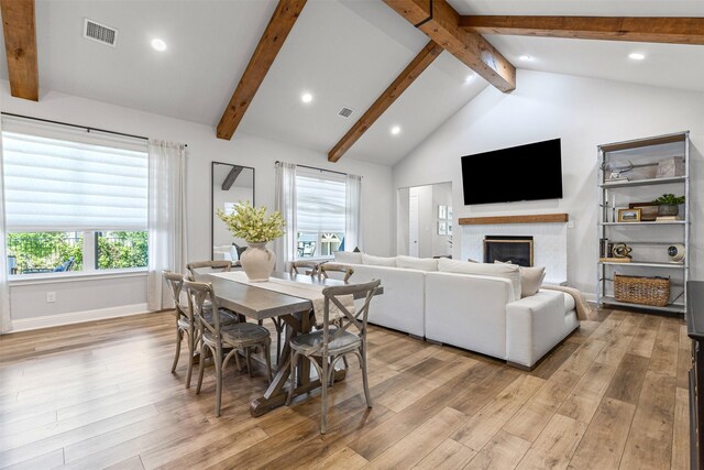 13645 Sweetwalk Pl, Fort Worth, TX 76008 - dining area featuring light wood-type flooring, beam ceiling, a fireplace, baseboards, and recessed lighting