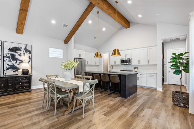 13645 Sweetwalk Pl, Fort Worth, TX 76008 - dining space with beamed ceiling, light wood finished floors, high vaulted ceiling, recessed lighting, and baseboards
