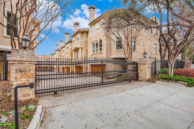 3907 Cole Ave Unit 5, Dallas, TX 75204 - view of gate with a fenced front yard