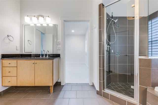3907 Cole Ave Unit 5, Dallas, TX 75204 - full bath featuring vanity, tile patterned flooring, and a stall shower