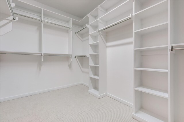 3907 Cole Ave Unit 5, Dallas, TX 75204 - walk in closet with carpet floors