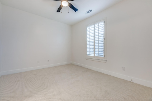 3907 Cole Ave Unit 5, Dallas, TX 75204 - empty room featuring baseboards, visible vents, carpet, and a healthy amount of sunlight