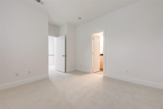3907 Cole Ave Unit 5, Dallas, TX 75204 - unfurnished bedroom featuring light carpet, baseboards, and visible vents