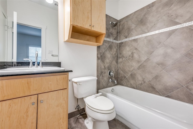 3907 Cole Ave Unit 5, Dallas, TX 75204 - bathroom with tile patterned flooring, toilet, vanity, and  shower combination