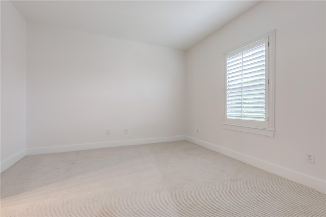 3907 Cole Ave Unit 5, Dallas, TX 75204 - spare room with baseboards and carpet