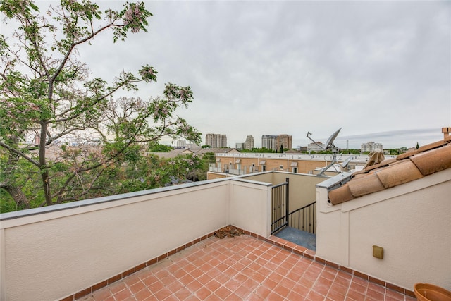 3907 Cole Ave Unit 5, Dallas, TX 75204 - view of patio with a city view and a balcony
