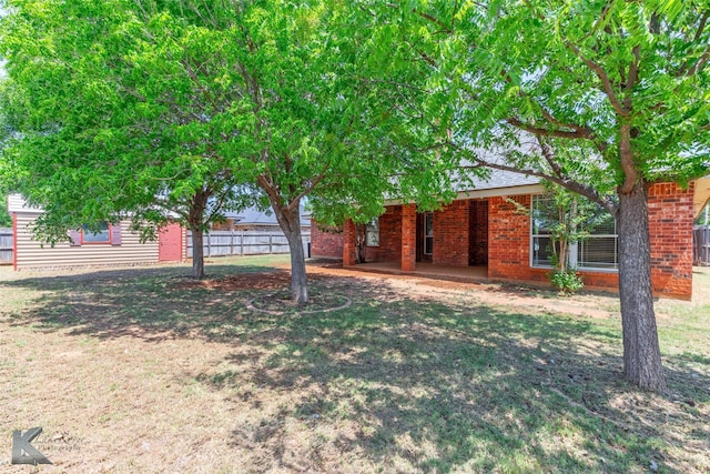 7018 Waterway Ln, Abilene, TX 79606 - view of yard with fence