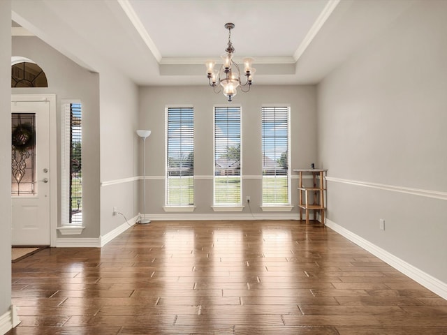 3300 S Bay Breeze Ln, Fort Worth, TX 76179 - entrance foyer with a chandelier, plenty of natural light, a tray ceiling, wood finished floors, and crown molding