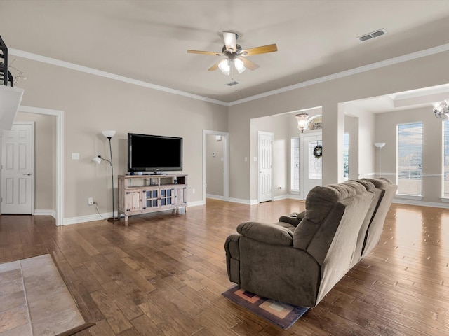 3300 S Bay Breeze Ln, Fort Worth, TX 76179 - living room with a ceiling fan, a chandelier, hardwood / wood-style floors, baseboards, and ornamental molding
