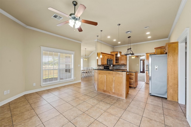 110 Bob White Cir, Lorena, TX 76655 - kitchen featuring light tile patterned floors, stainless steel appliances, visible vents, and dark countertops