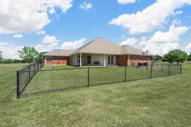 110 Bob White Cir, Lorena, TX 76655 - back of house with a lawn, a fenced backyard, and brick siding