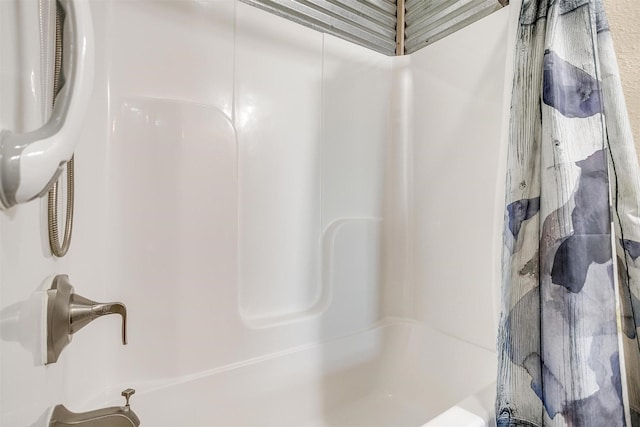 bathroom featuring walk in shower