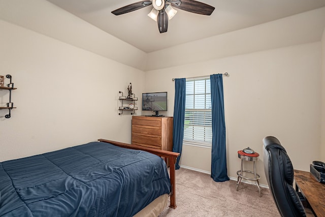 bedroom featuring vaulted ceiling, carpet floors, a ceiling fan, and baseboards