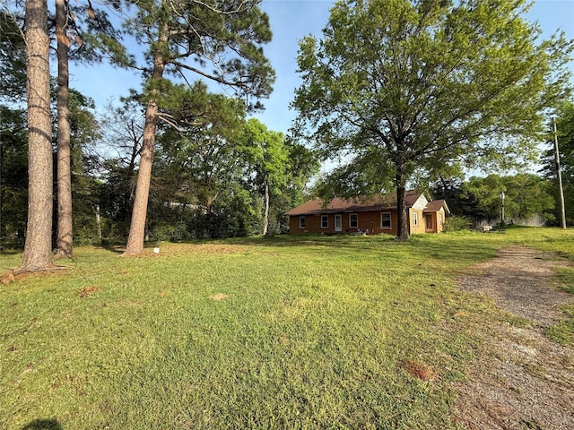 615 Quitman St, Pittsburg, TX 75686 - view of grassy yard