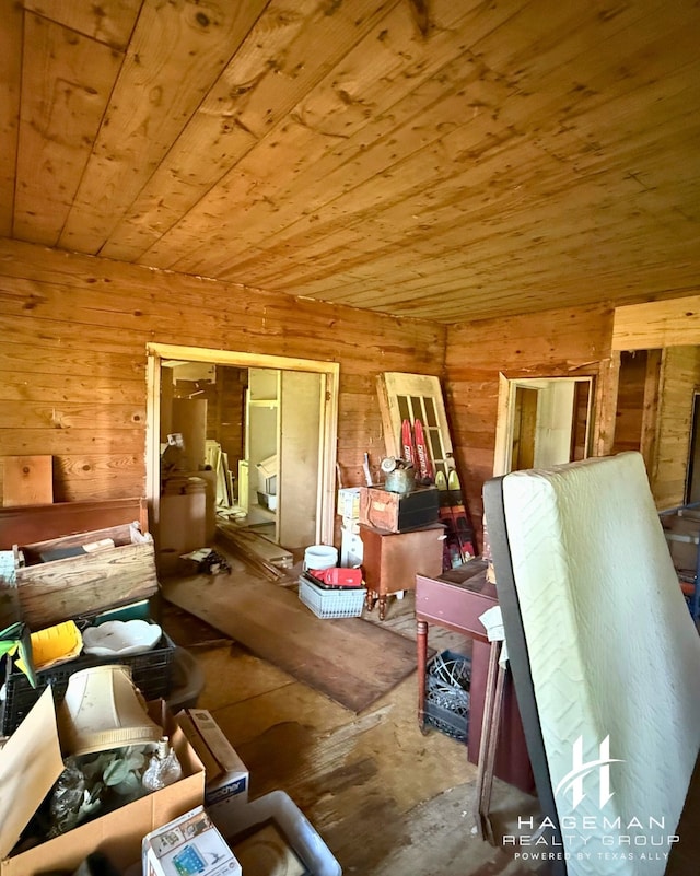 615 Quitman St, Pittsburg, TX 75686 - bonus room featuring wooden ceiling and wooden walls