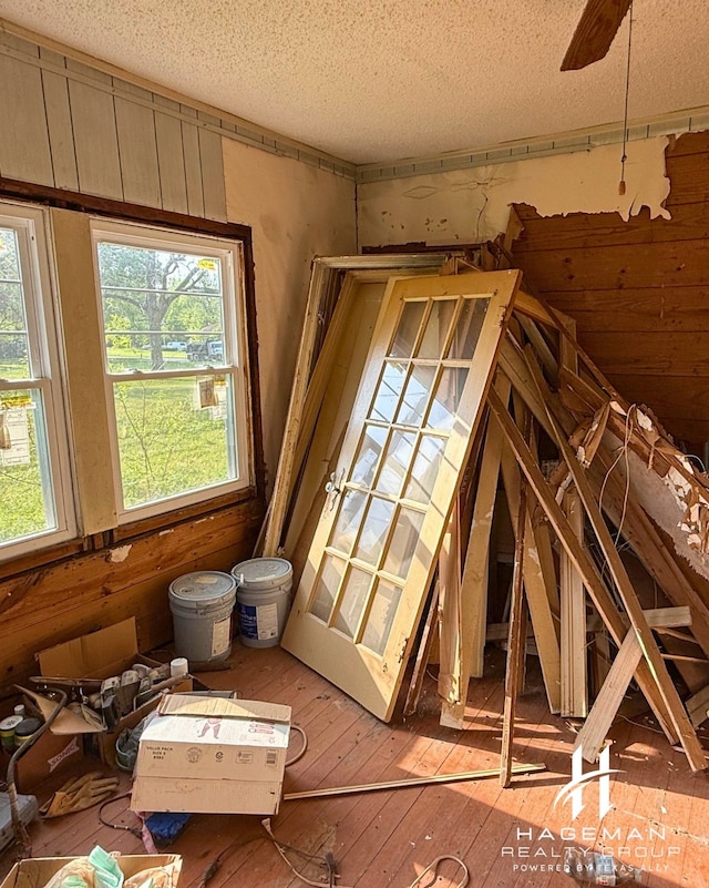 615 Quitman St, Pittsburg, TX 75686 - interior space with healthy amount of natural light, light wood finished floors, and a textured ceiling