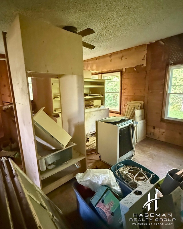 615 Quitman St, Pittsburg, TX 75686 - miscellaneous room featuring a textured ceiling and a ceiling fan