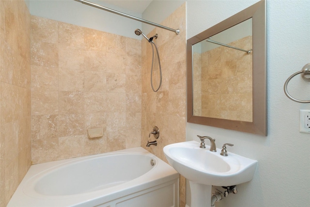 full bath with shower / bathtub combination and a sink
