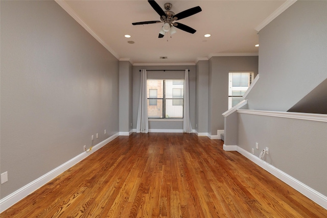 unfurnished room featuring baseboards, a ceiling fan, wood finished floors, and recessed lighting