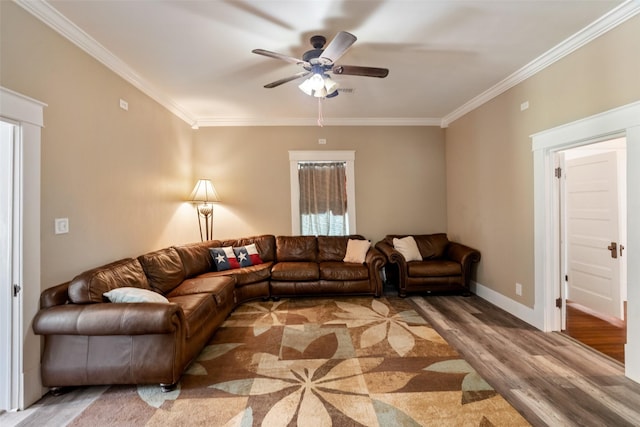 479 County Road 27450, Honey Grove, TX 75477 - living room with baseboards, wood finished floors, ceiling fan, and crown molding