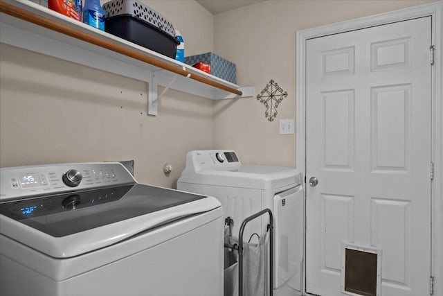 laundry room with laundry area and washer and dryer