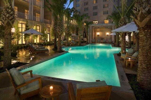 community pool featuring a patio area