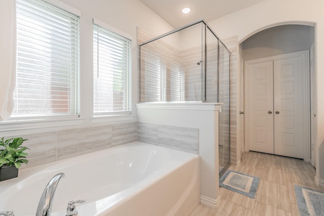 2061 Miramar Dr, Little Elm, TX 75068 - bathroom featuring a garden tub and a stall shower
