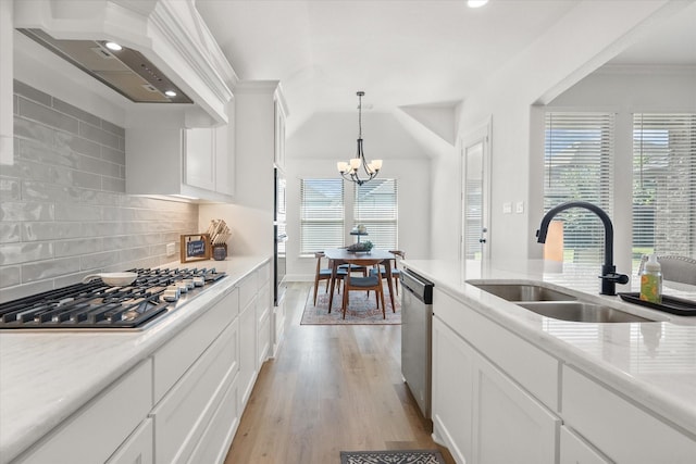 1503 Evening Primrose Dr, Mansfield, TX 76063 - kitchen featuring a sink, appliances with stainless steel finishes, custom range hood, plenty of natural light, and recessed lighting