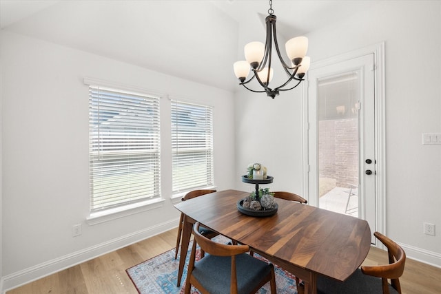 1503 Evening Primrose Dr, Mansfield, TX 76063 - dining room featuring a chandelier, light wood finished floors, and baseboards