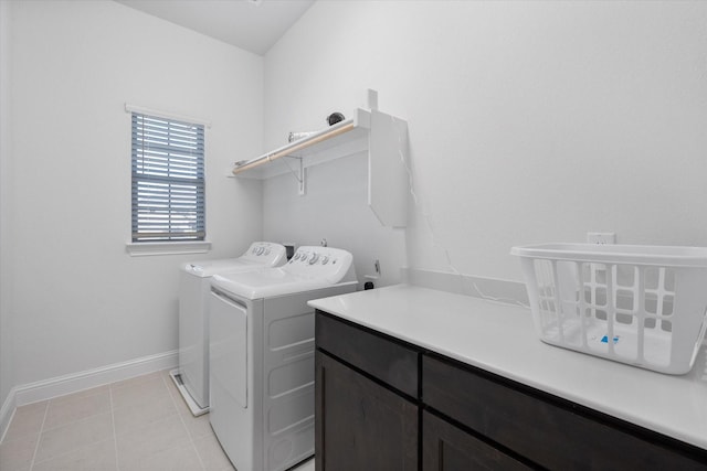 1503 Evening Primrose Dr, Mansfield, TX 76063 - washroom featuring washer and dryer, baseboards, cabinet space, and light tile patterned flooring