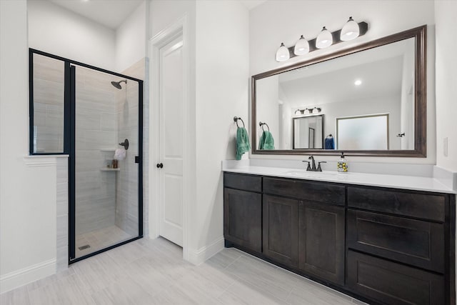 1503 Evening Primrose Dr, Mansfield, TX 76063 - bathroom featuring baseboards, a shower stall, vanity, and recessed lighting