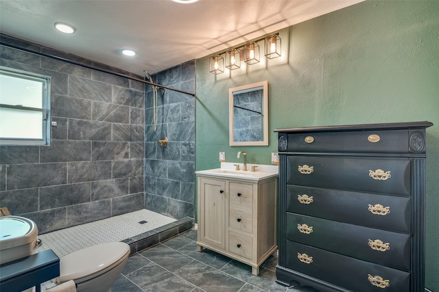 full bath featuring recessed lighting, marble finish floor, toilet, vanity, and a stall shower